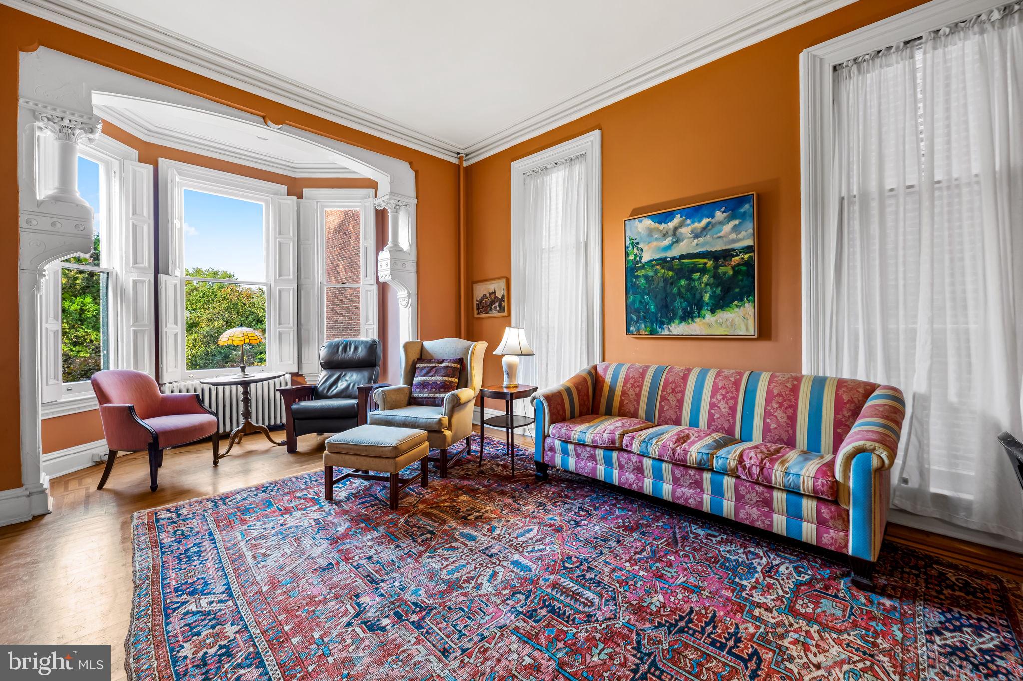 1310 Bolton Street Baltimore, MD 21217 - Photo 33 of 69 a living room with furniture and a large window