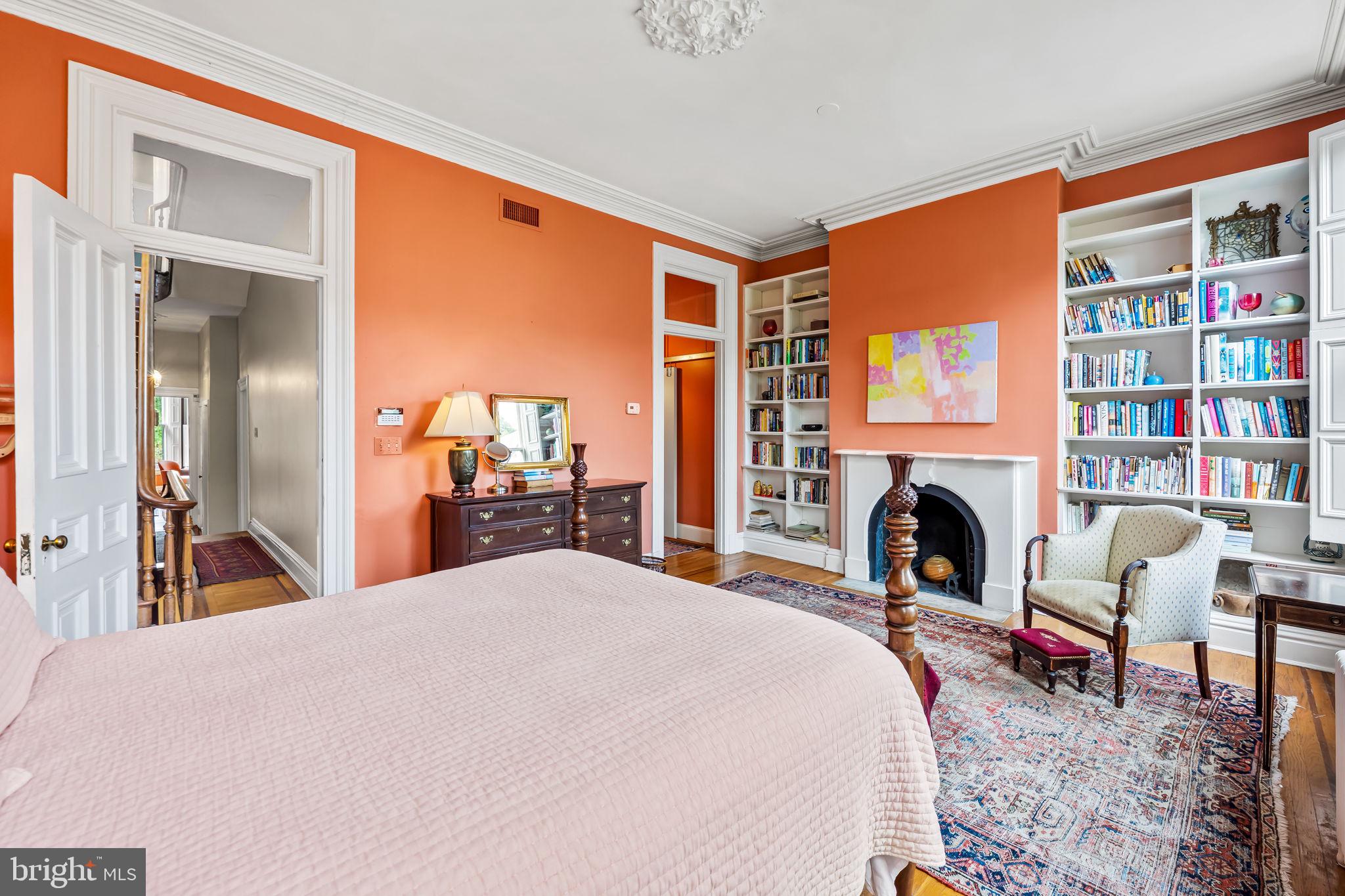 1310 Bolton Street Baltimore, MD 21217 - Photo 42 of 69 a bed room with a bed and a chair