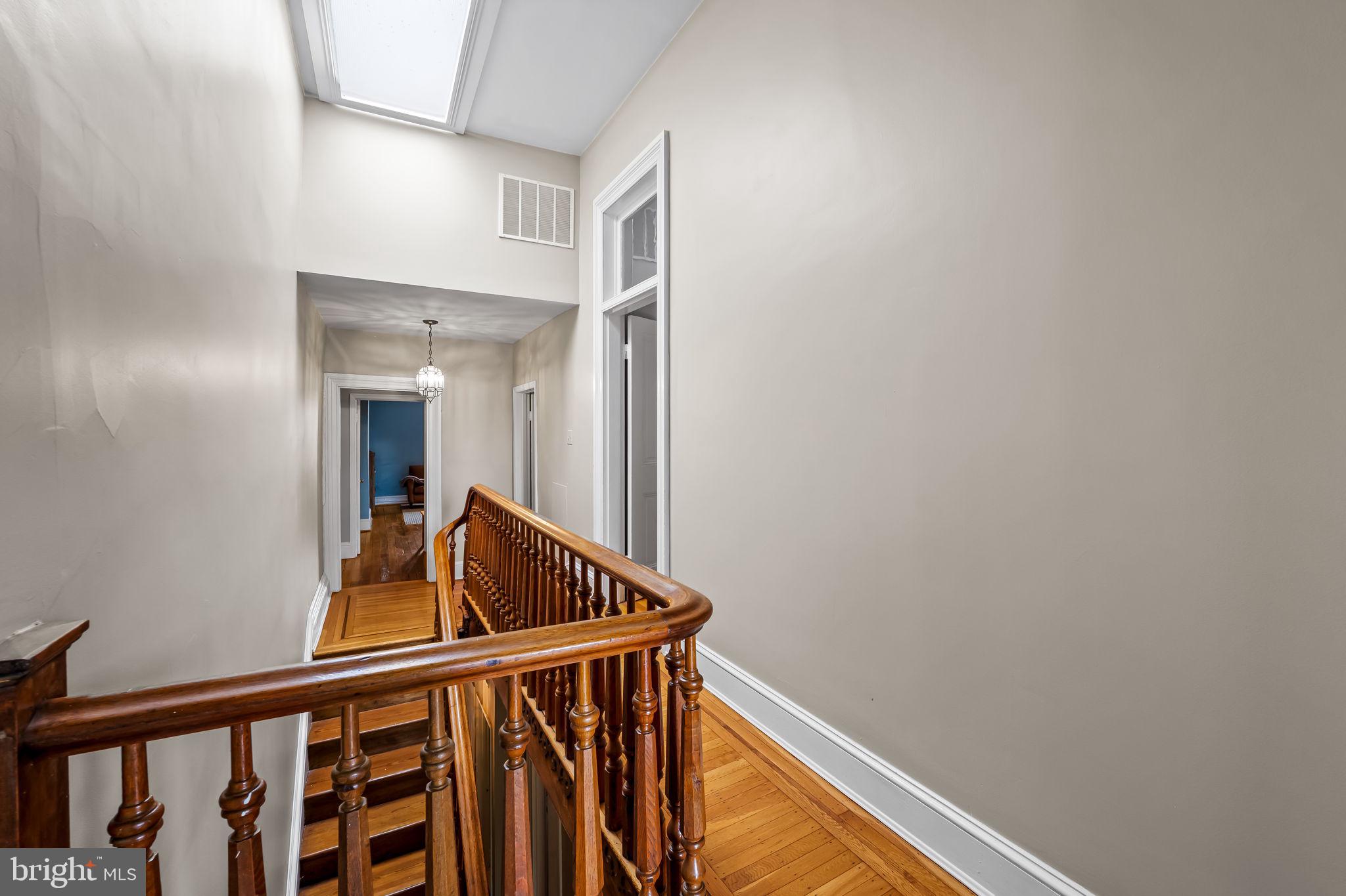 1310 Bolton Street Baltimore, MD 21217 - Photo 46 of 69 a view of entryway with wooden floor