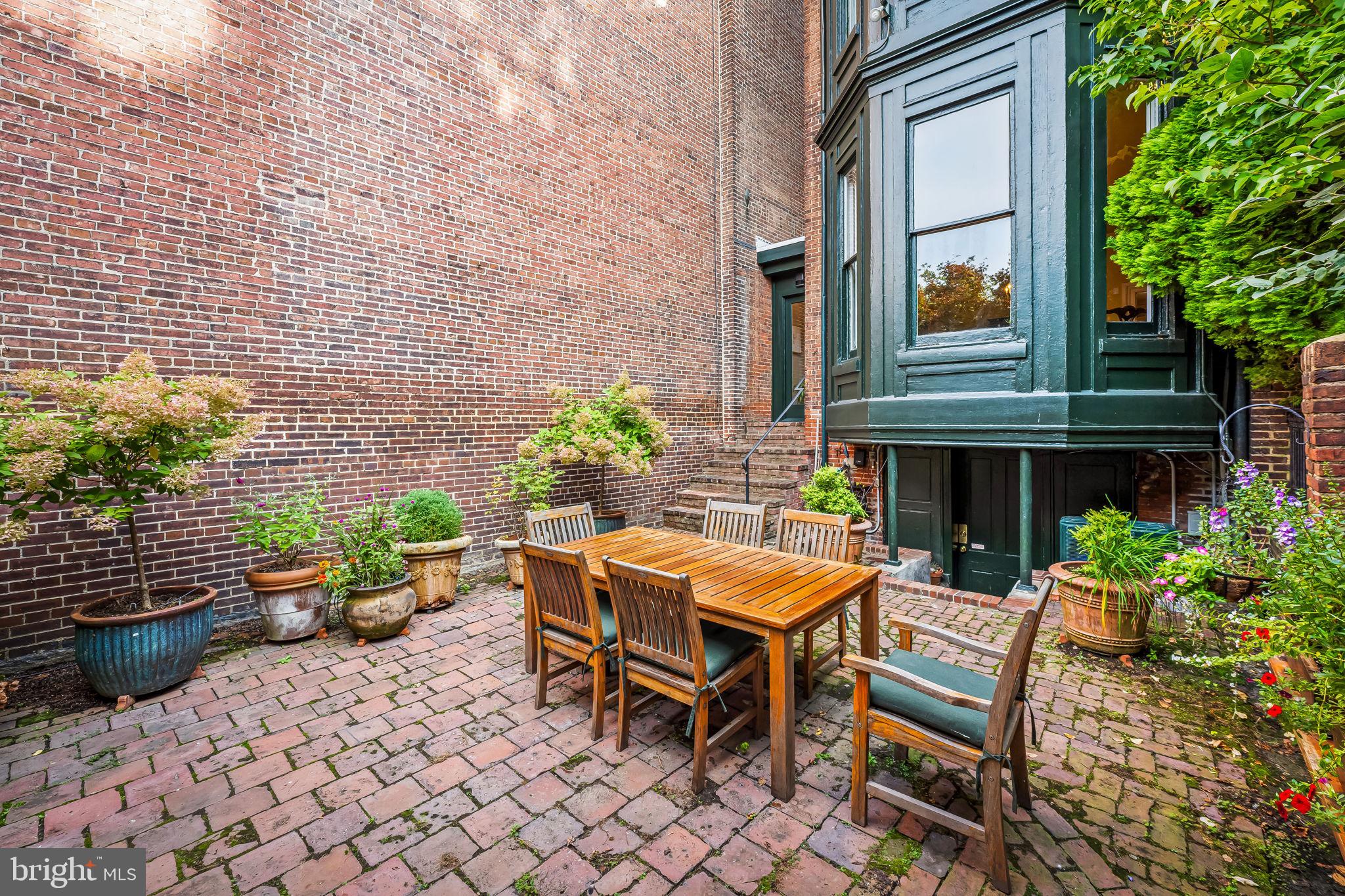 1310 Bolton Street Baltimore, MD 21217 - Photo 60 of 69 a outdoor seating area with furniture and garden