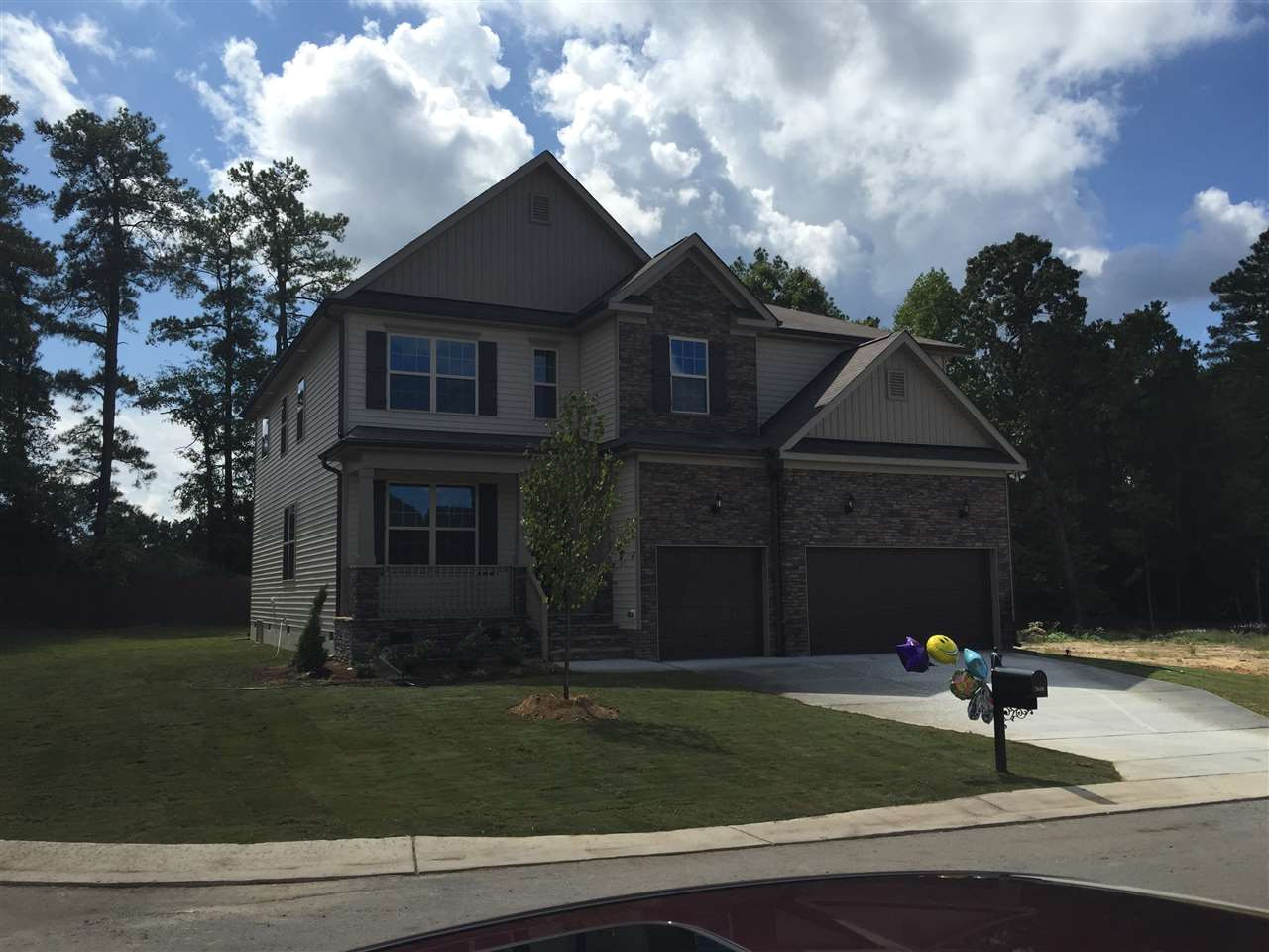 7616 Channery Way Raleigh, NC 27616 - Photo 1 of 1 a front view of a house with a yard