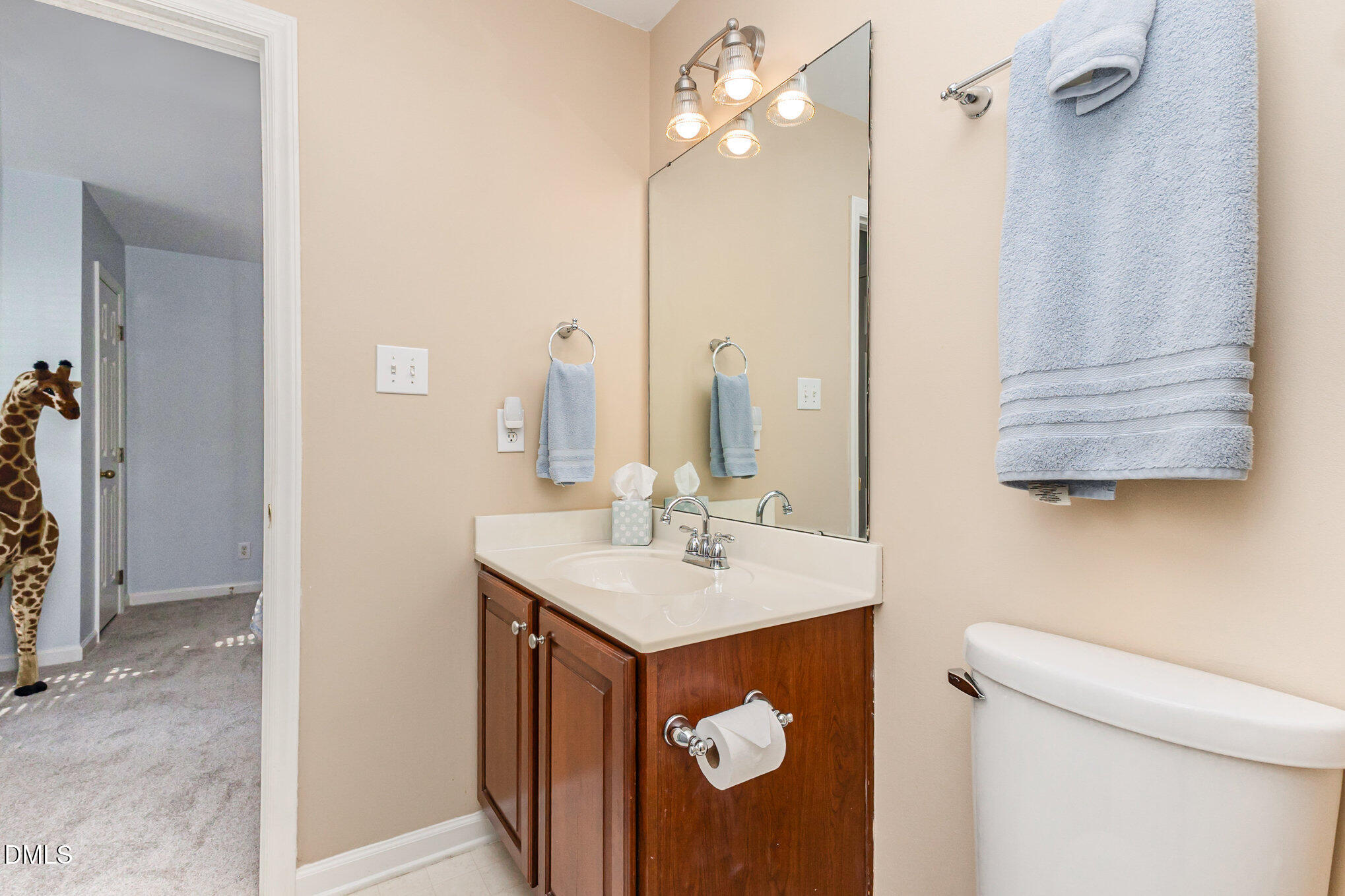 102 Higher Learning Drive Durham, NC 27713 - Photo 22 of 28 a bathroom with a sink a toilet and shower