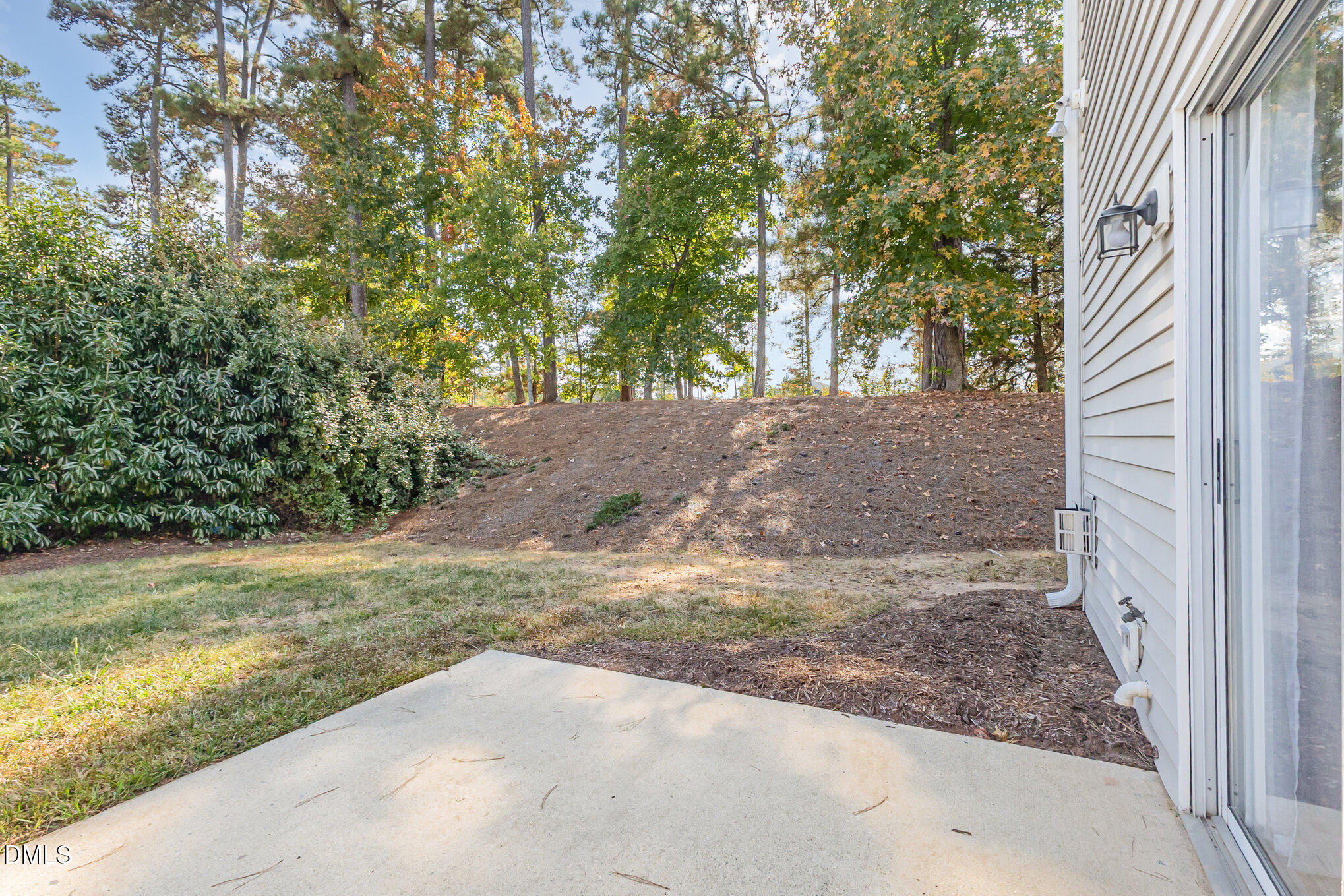 102 Higher Learning Drive Durham, NC 27713 - Photo 23 of 28 a view of a yard with plants and trees