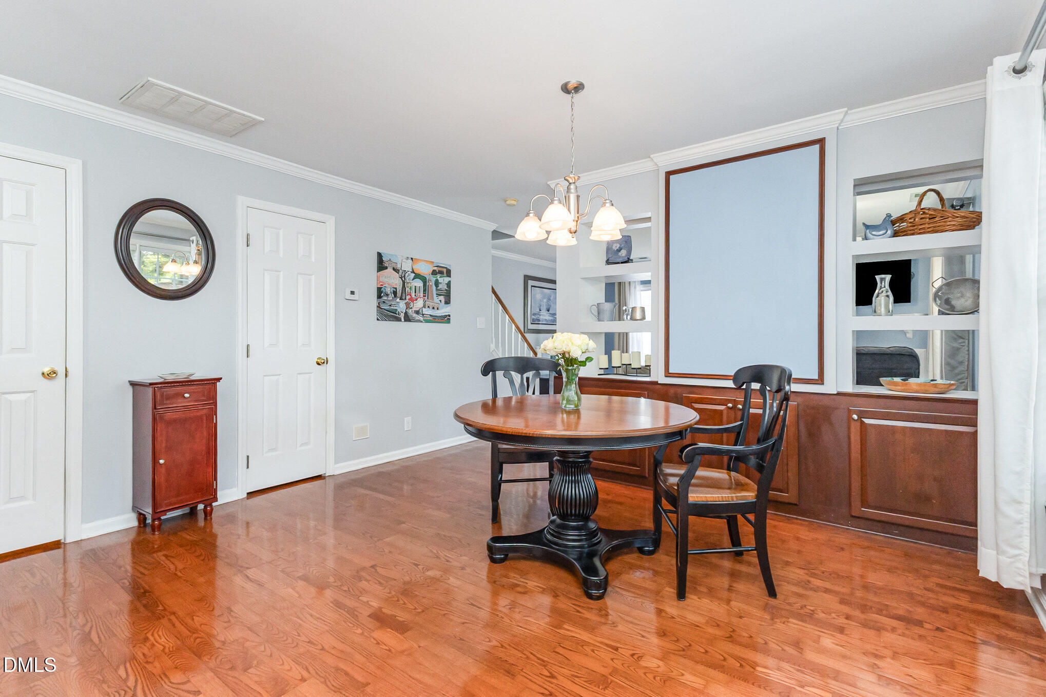 102 Higher Learning Drive Durham, NC 27713 - Photo 7 of 28 a view of a dining room with furniture and wooden floor