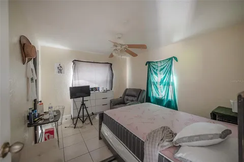 a kitchen with stainless steel appliances a refrigerator and a stove top oven