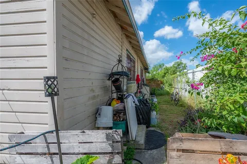 a kitchen with a stove a sink and a refrigerator