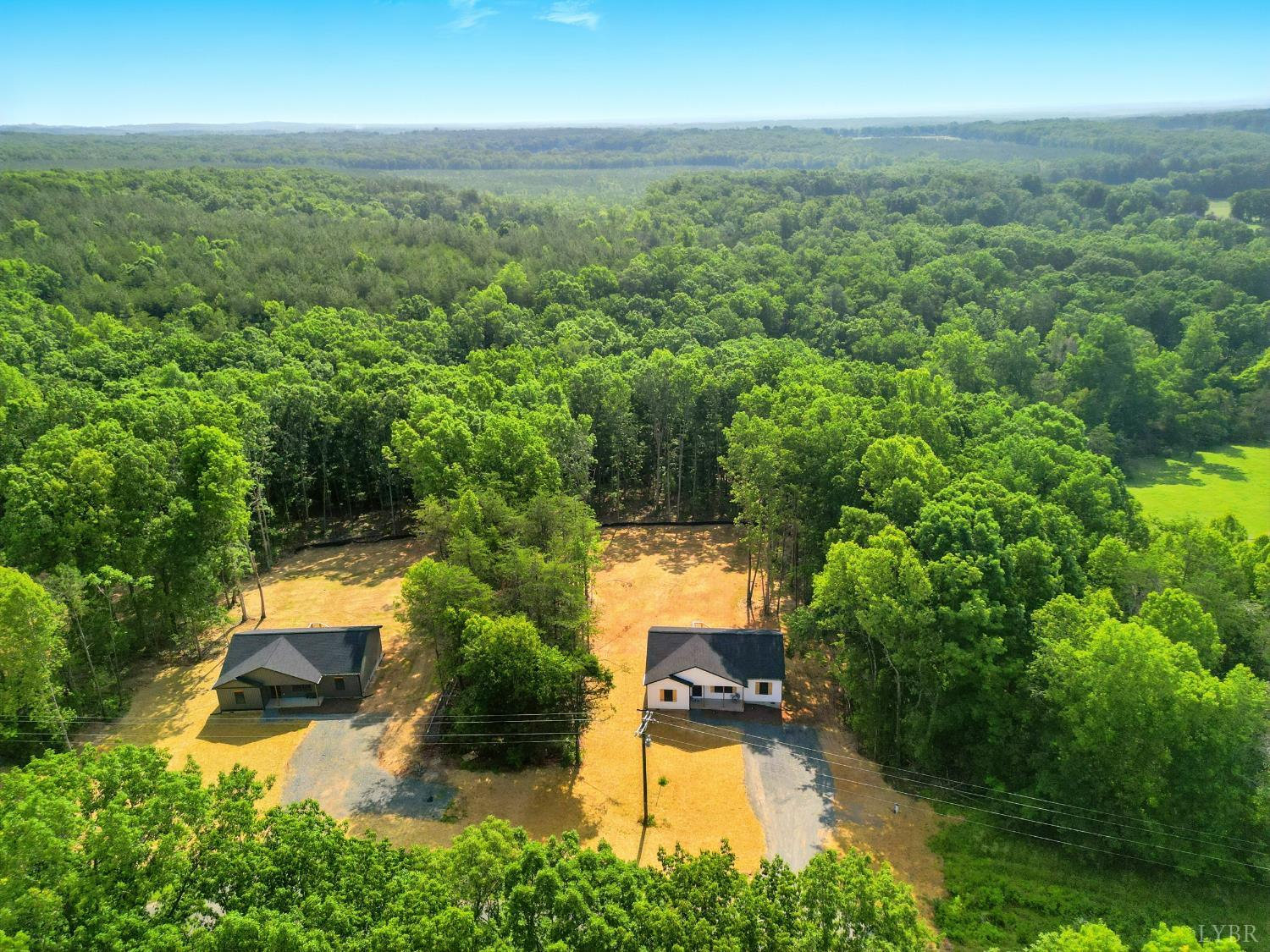 3470 Double Bridges Road Spout Spring, VA 24593 - Photo 38 of 40 an aerial view of a house with a yard