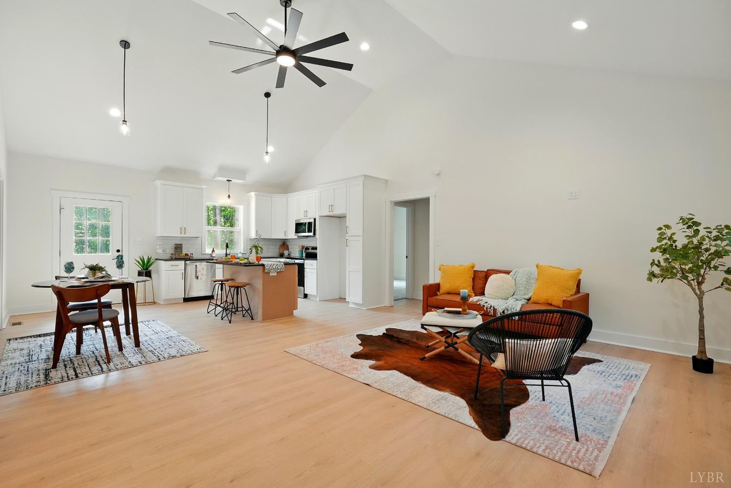 3470 Double Bridges Road Spout Spring, VA 24593 - Photo 5 of 40 a living room with furniture and kitchen view