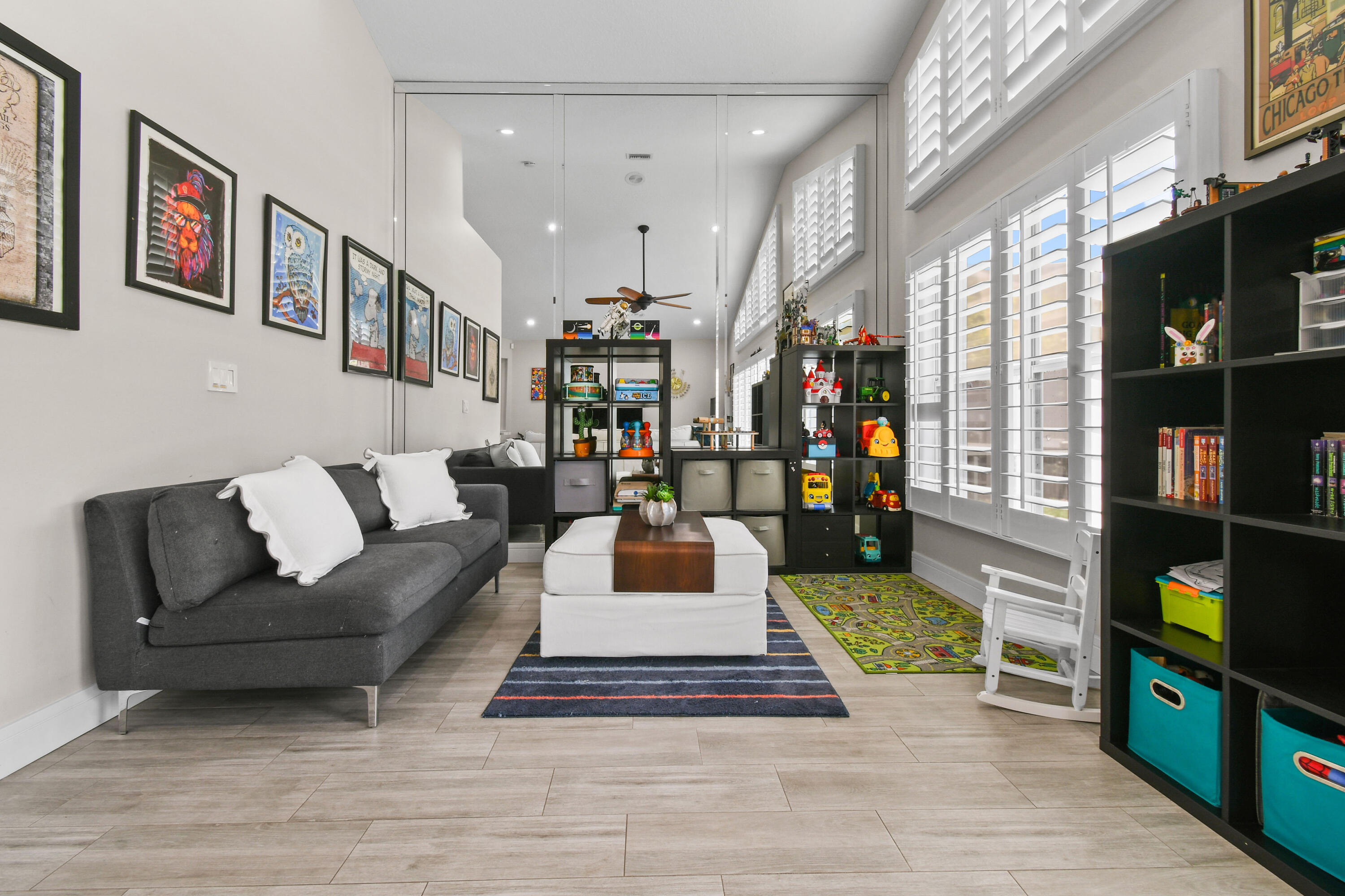 303 Hardwood Point Jupiter, FL 33458 - Photo 18 of 75 a living room with furniture and a flat screen tv