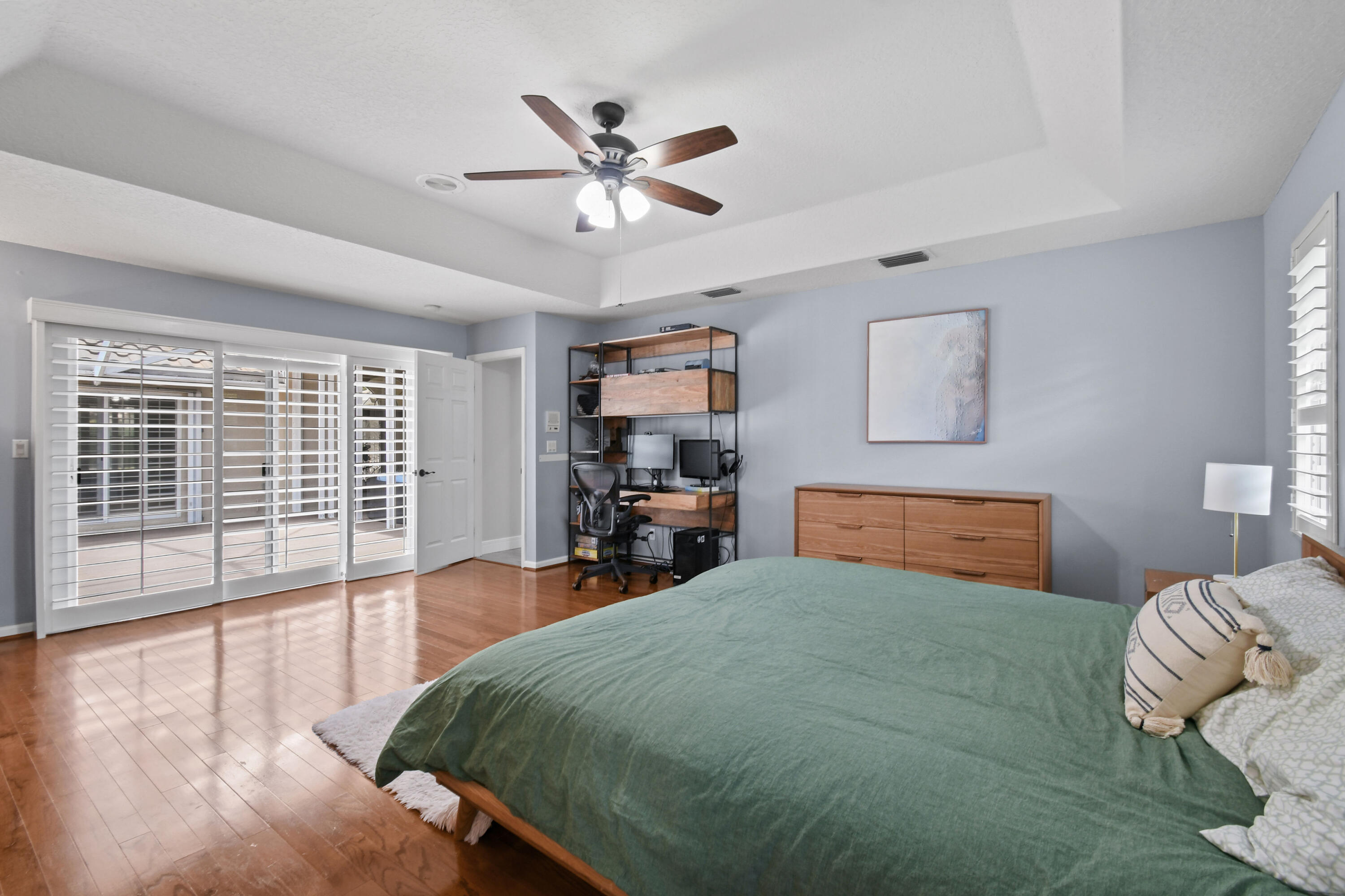 303 Hardwood Point Jupiter, FL 33458 - Photo 29 of 75 a bedroom with a large bed and a large window