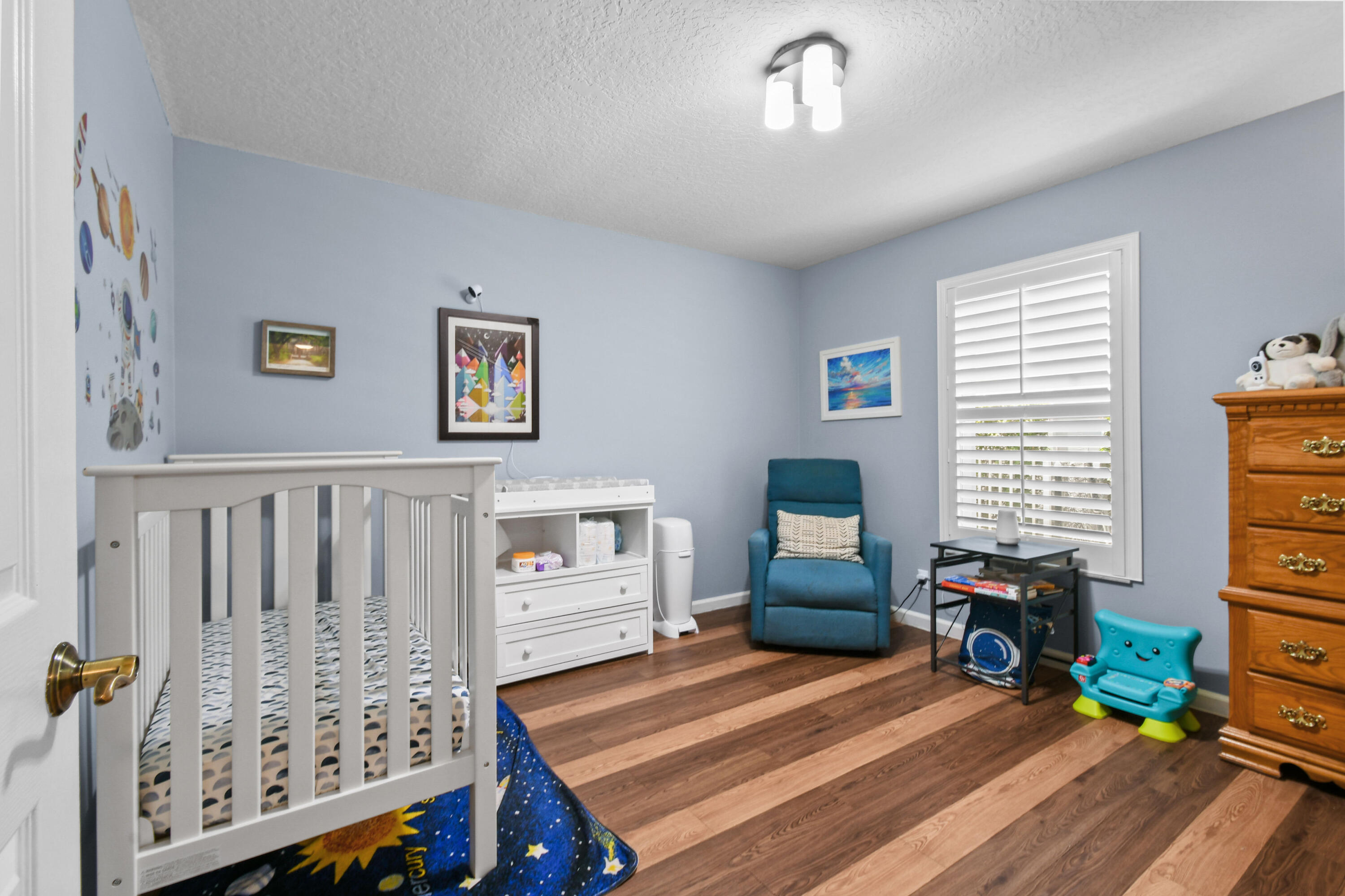 303 Hardwood Point Jupiter, FL 33458 - Photo 41 of 75 a bedroom with furniture and a window