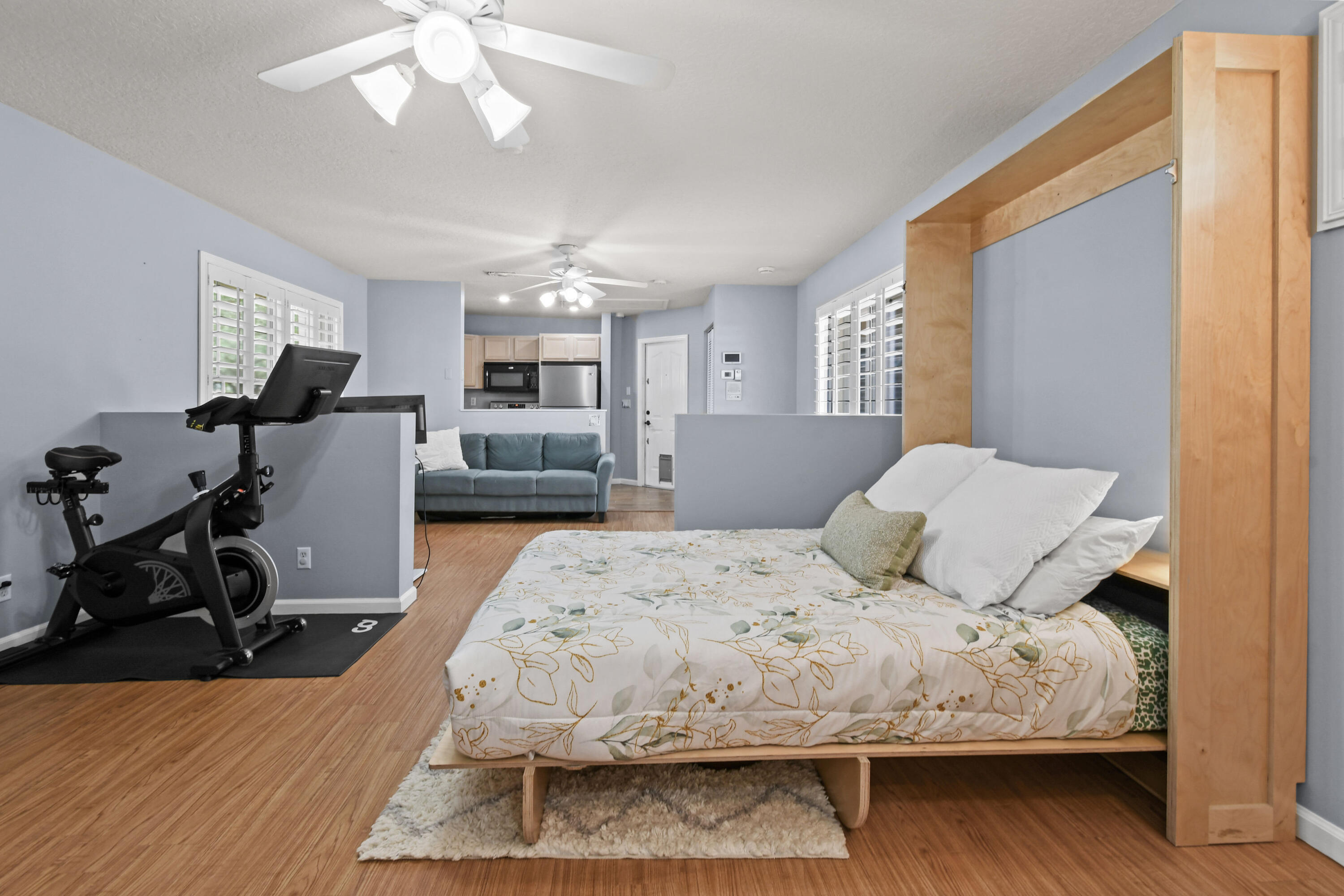 303 Hardwood Point Jupiter, FL 33458 - Photo 51 of 75 a bedroom with a bed and wooden floor