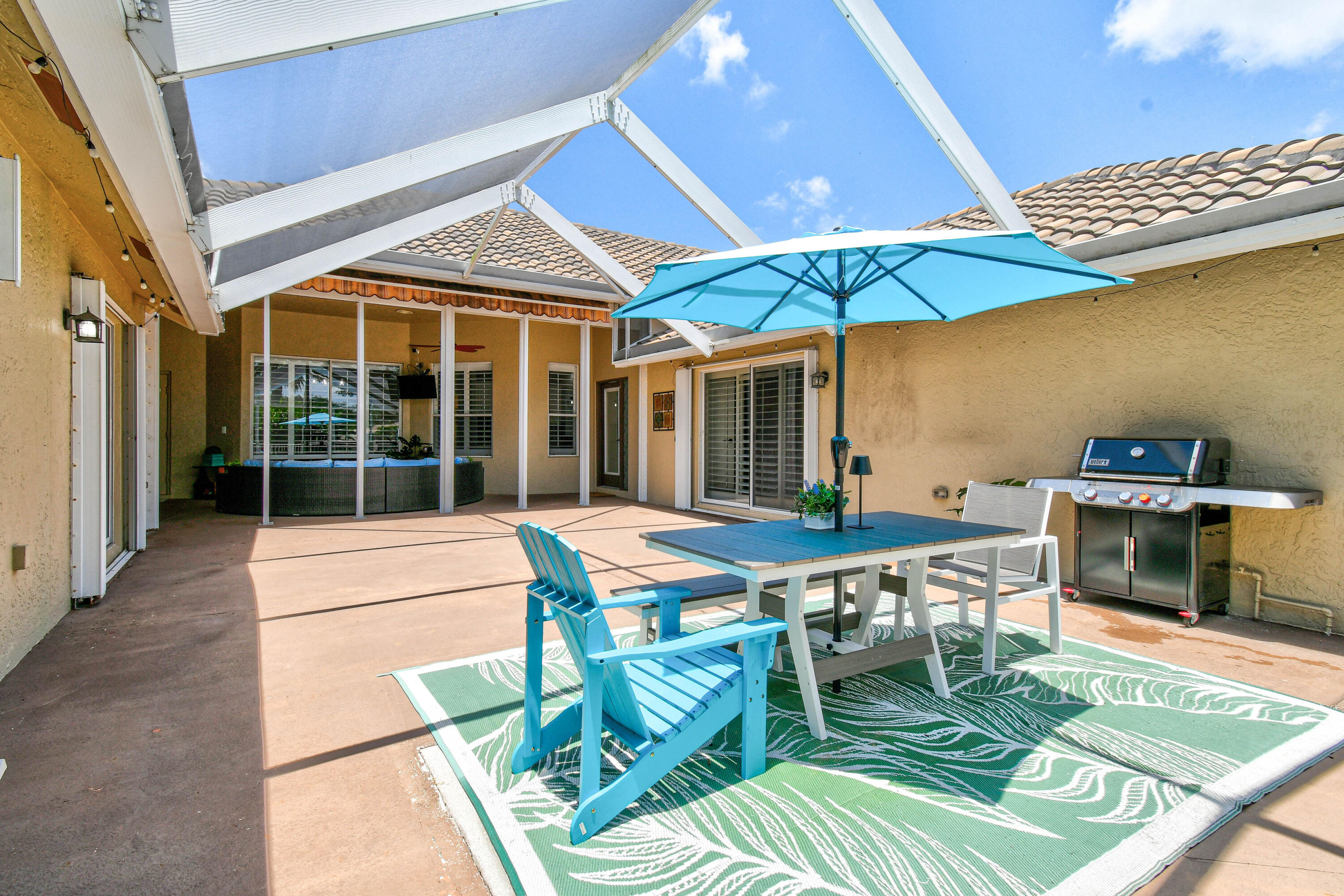 303 Hardwood Point Jupiter, FL 33458 - Photo 55 of 75 Patio Between Home and Guest