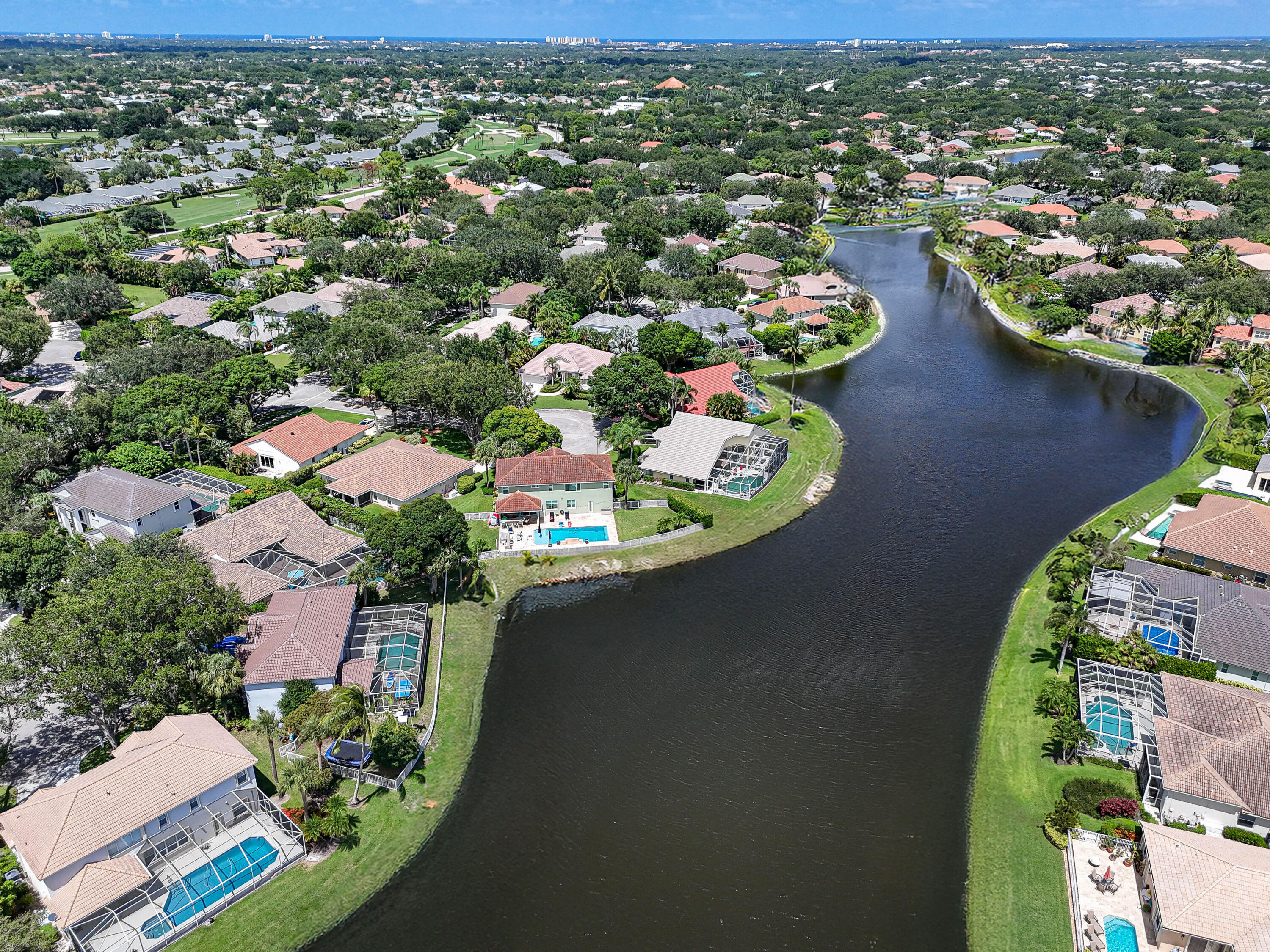 303 Hardwood Point Jupiter, FL 33458 - Photo 65 of 75 an aerial view of a house with a lake view