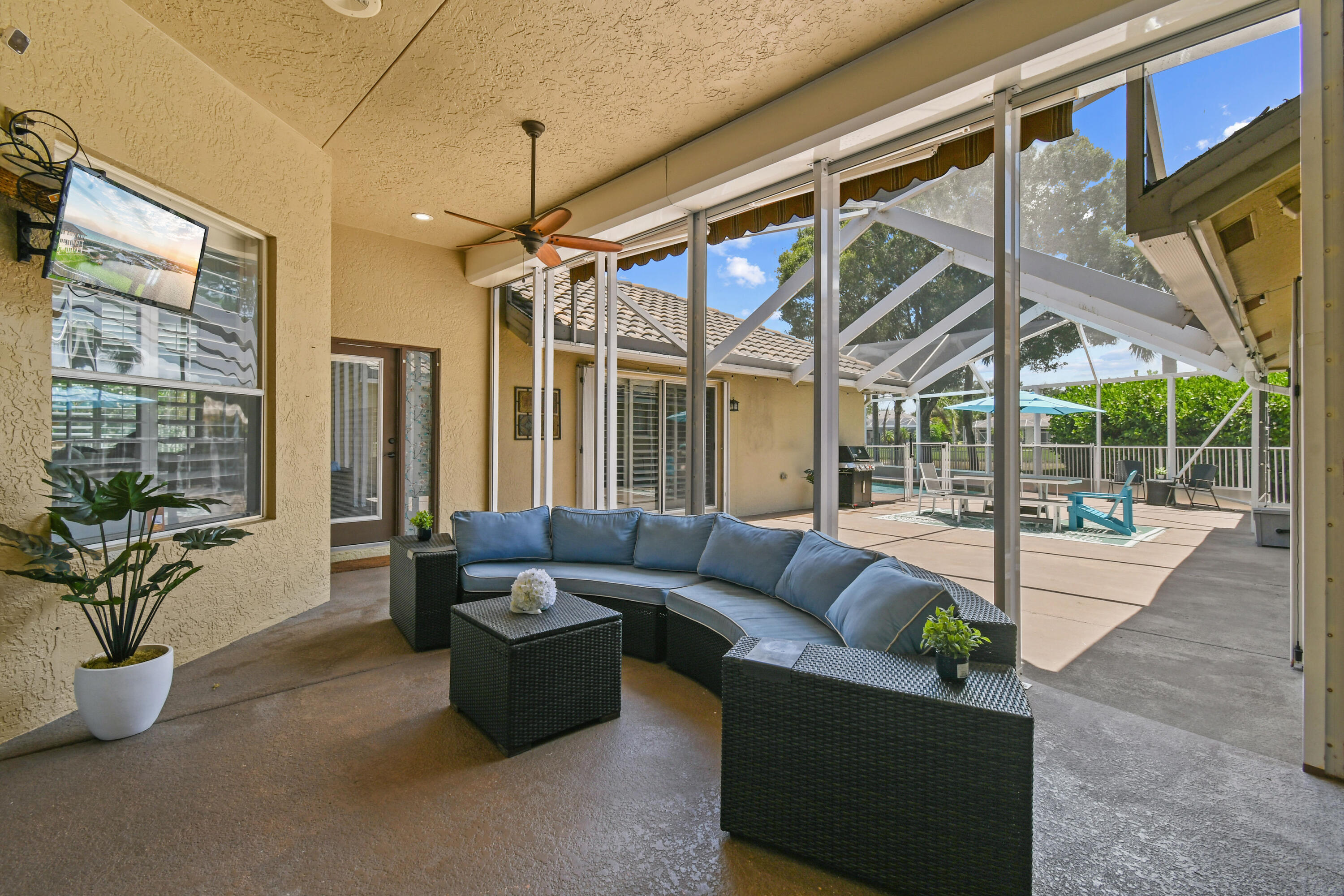 303 Hardwood Point Jupiter, FL 33458 - Photo 9 of 75 a living room with furniture and a glass door