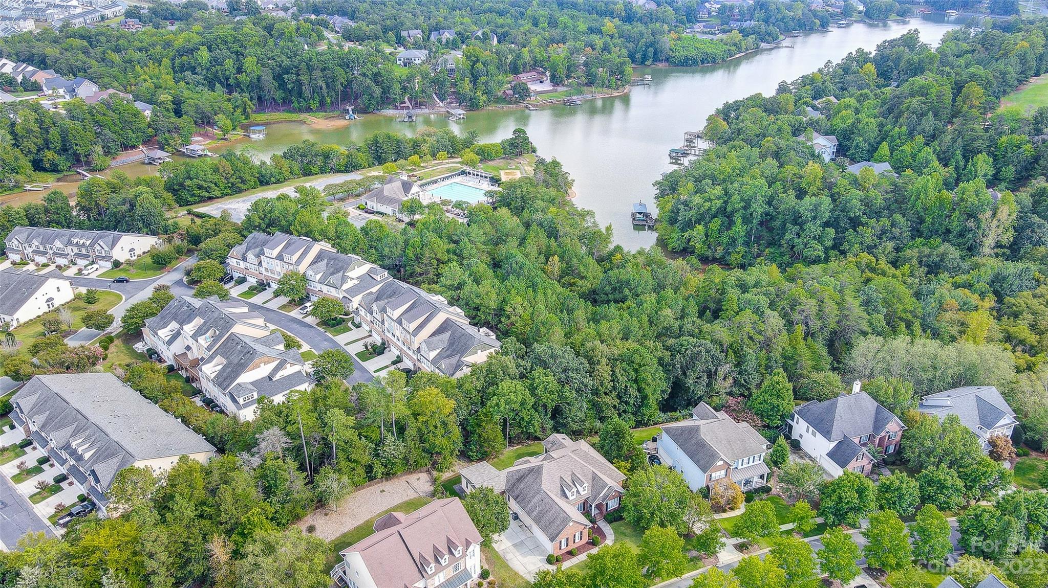 203 Shoreline Parkway Tega Cay, SC 29708 - Photo 1 of 42 an aerial view of a house with outdoor space and lake view