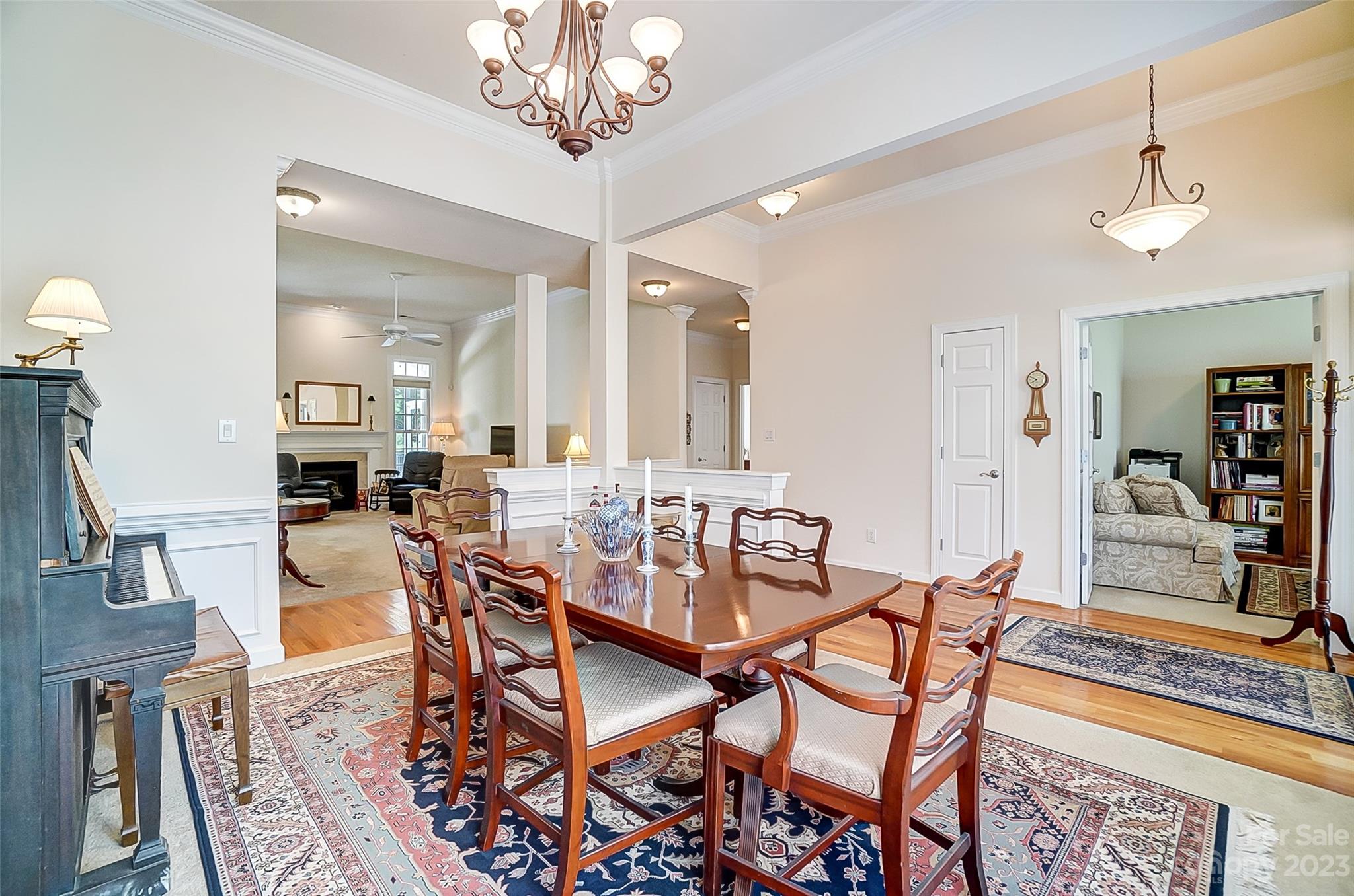 203 Shoreline Parkway Tega Cay, SC 29708 - Photo 22 of 42 a view of a dining room with furniture