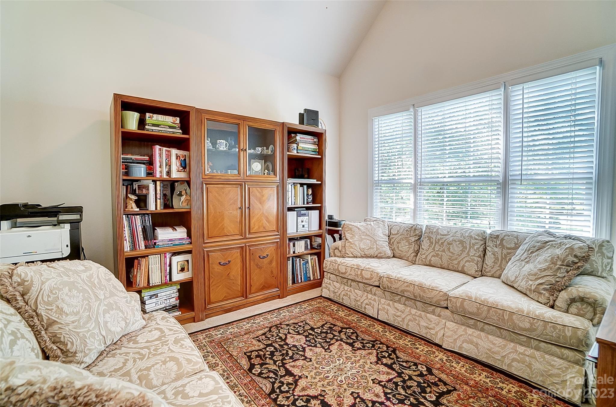 203 Shoreline Parkway Tega Cay, SC 29708 - Photo 23 of 42 a living room with furniture and a window