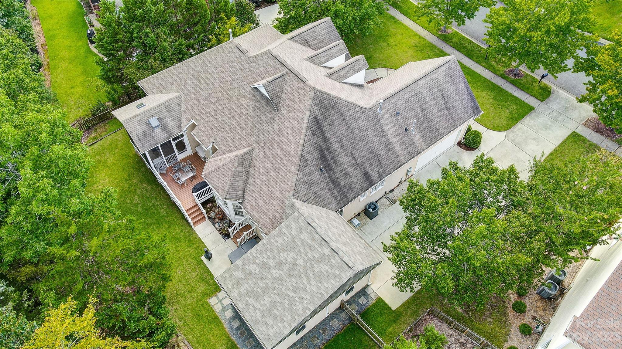 203 Shoreline Parkway Tega Cay, SC 29708 - Photo 3 of 42 an aerial view of a house