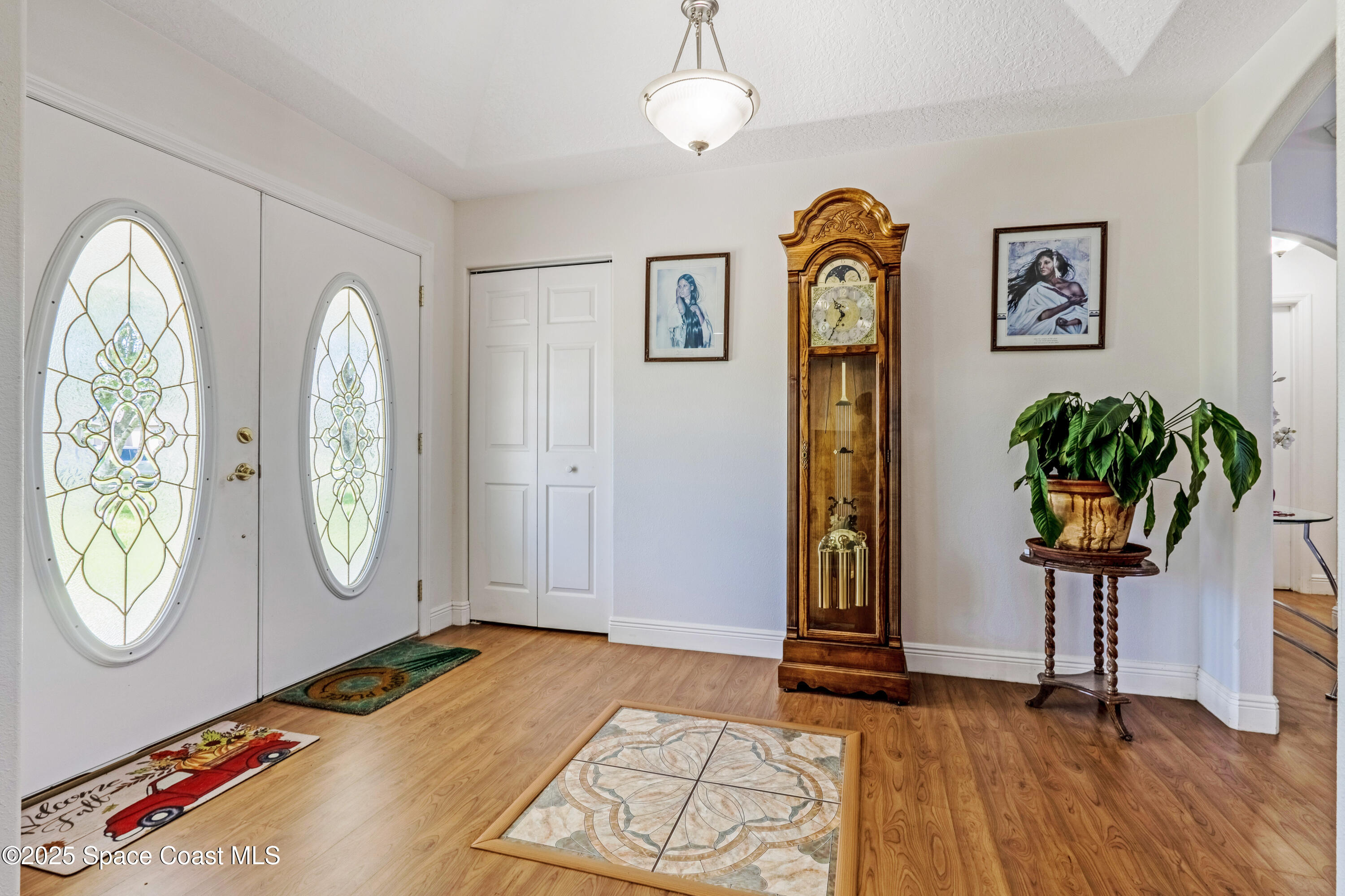 4985 Hamlin Circle Mims, FL 32754 - Photo 7 of 39 a front view of a house with garden