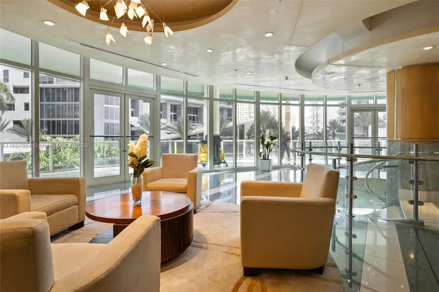 a front view of a building with a garden