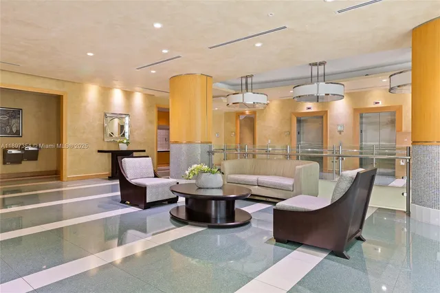 a city street with tall building and a large tree