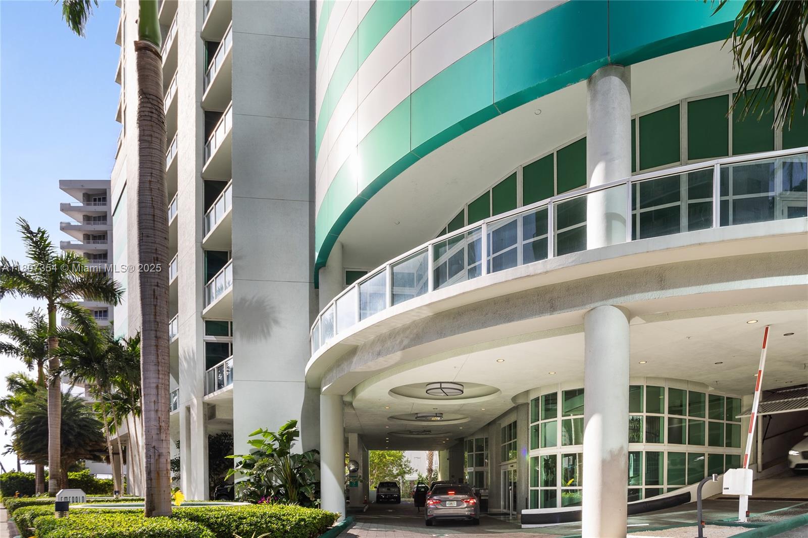 218 Southeast 14th Street, Unit 2105 Miami, FL 33131 - Photo 34 of 36 a front view of a building with a garden