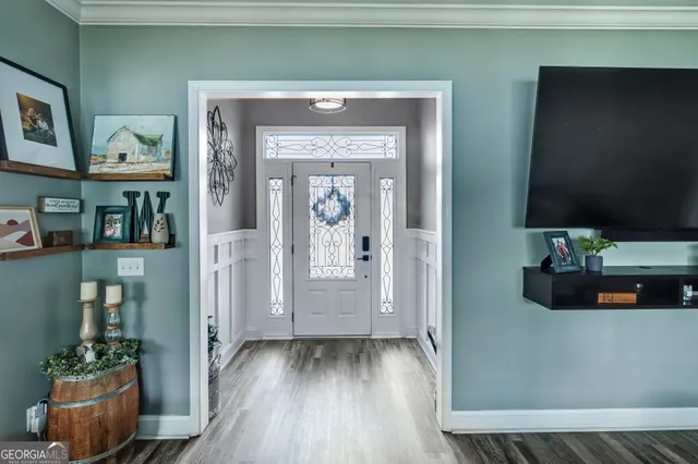 a view of livingroom with furniture and wooden floor