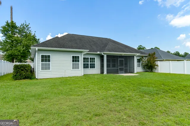 a house view with a garden space