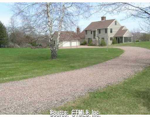 190 Powder Hill Road Middlefield, CT 06455 - Photo 1 of 1 a view of a big house with a big yard and large trees