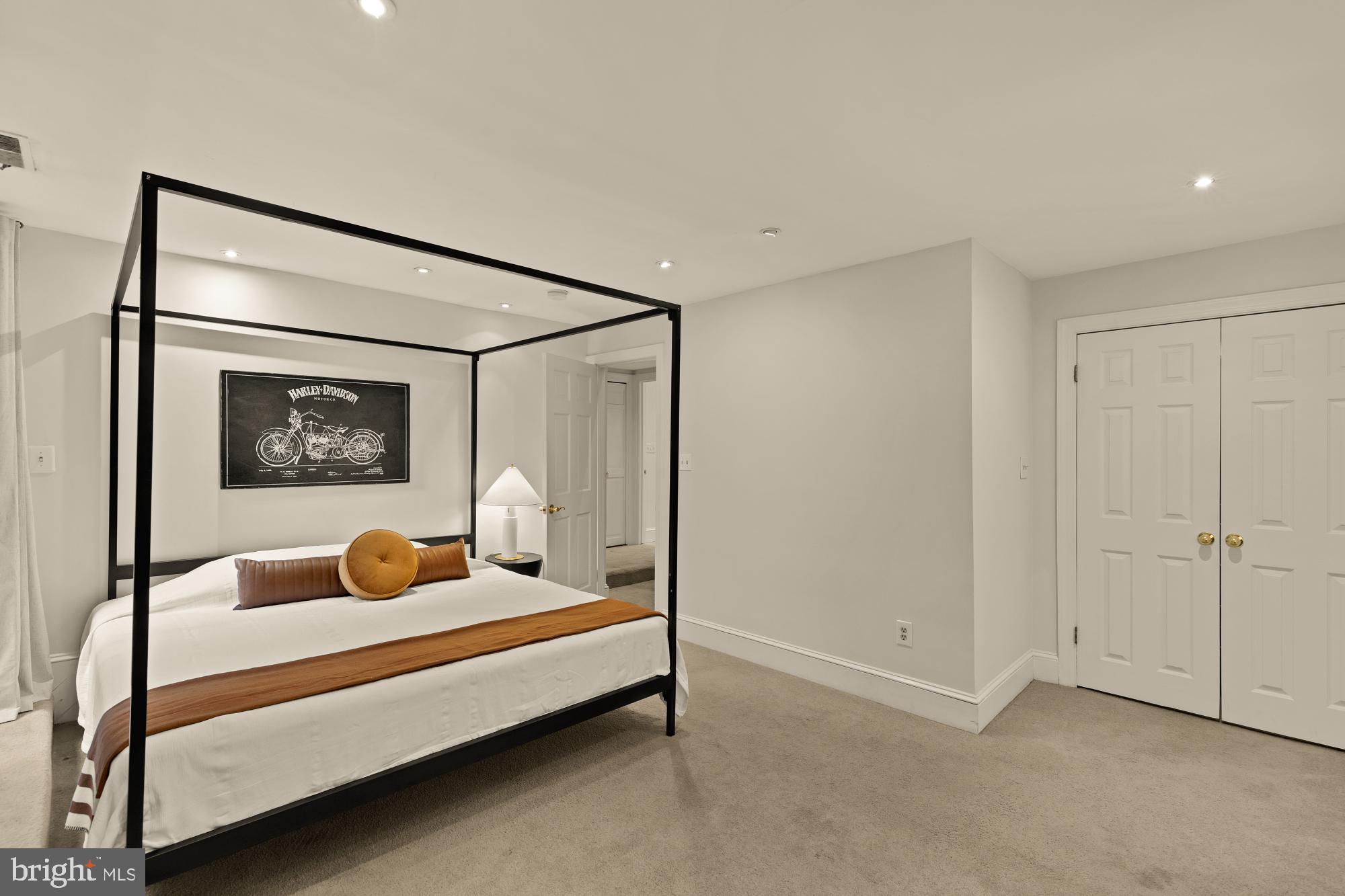 6 Logan Circle Northwest, Unit 2 Washington, DC 20005 - Photo 15 of 27 a bedroom with bed and a window