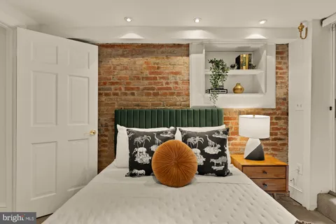 a room with furniture and a large window