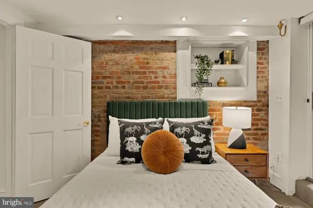 a room with furniture and a large window