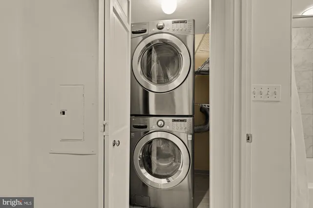 a utility room with dryer and washer