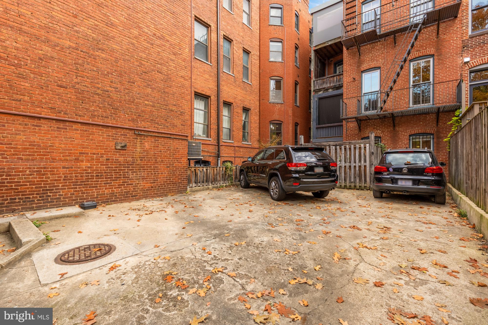 6 Logan Circle Northwest, Unit 2 Washington, DC 20005 - Photo 26 of 27 a car parked in front of a building