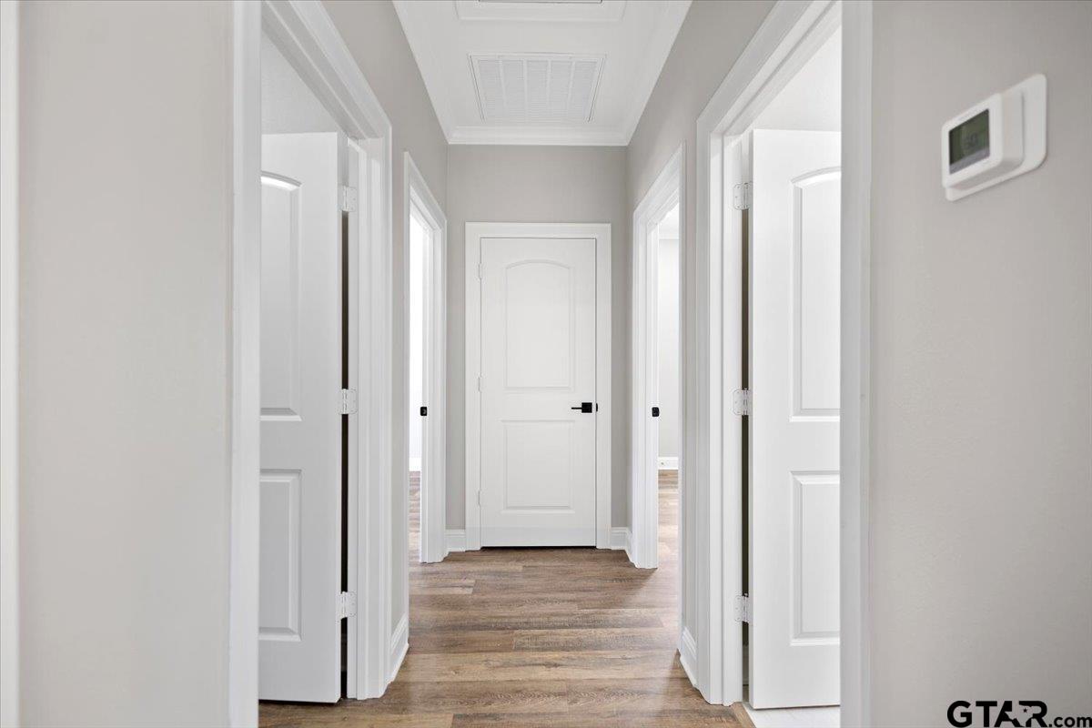 528 West 32nd Street Tyler, TX 75702 - Photo 27 of 29 a view of a hallway with wooden floor