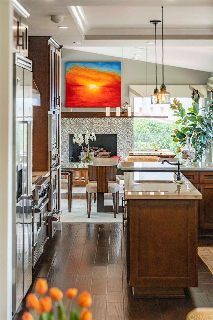1539 Vía Coronel Palos Verdes Estates, CA 90274 - Photo 17 of 52 a kitchen with stainless steel appliances granite countertop a stove and a refrigerator