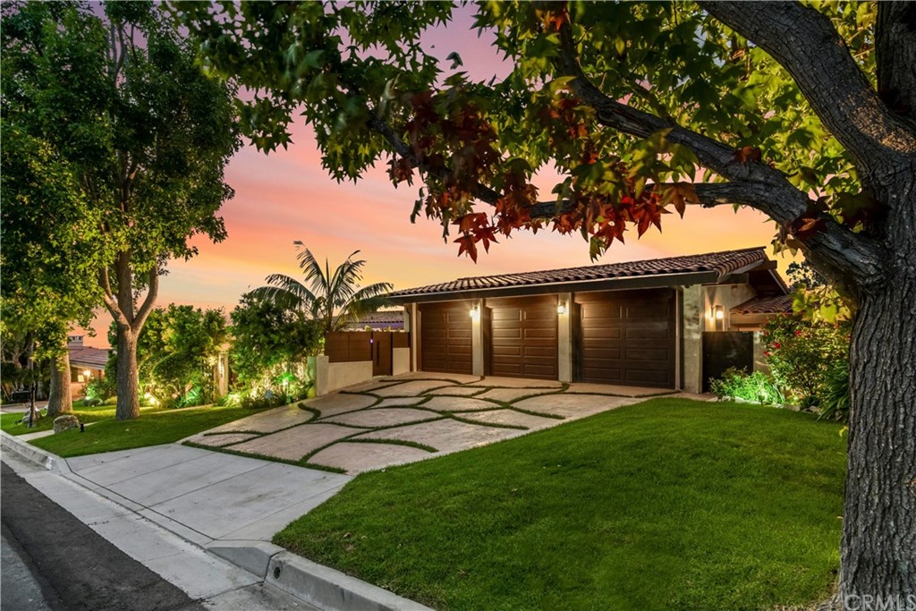 1539 Vía Coronel Palos Verdes Estates, CA 90274 - Photo 2 of 52 a view of a yard with a house in the background