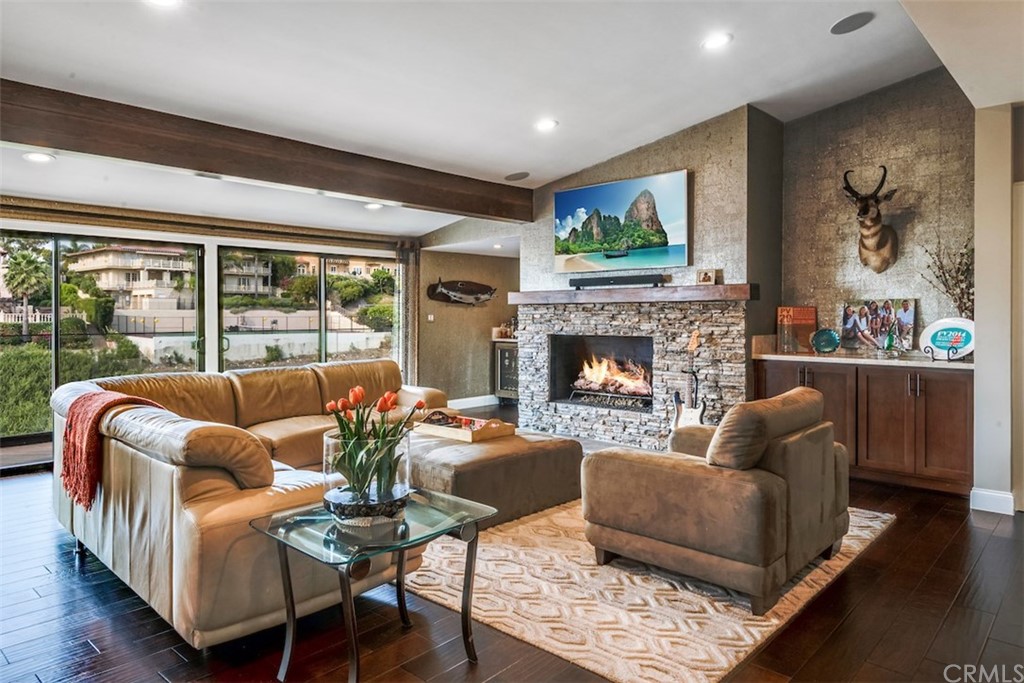 1539 Vía Coronel Palos Verdes Estates, CA 90274 - Photo 22 of 52 a living room with furniture fireplace and a large window