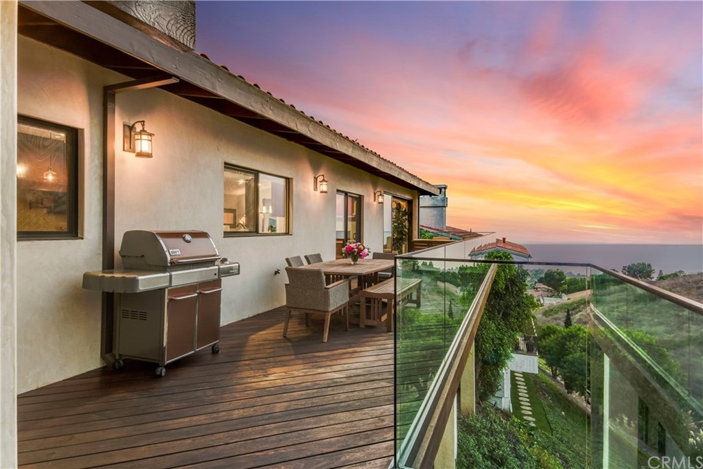 1539 Vía Coronel Palos Verdes Estates, CA 90274 - Photo 24 of 52 a terrace of a house with wooden floor and outdoor seating
