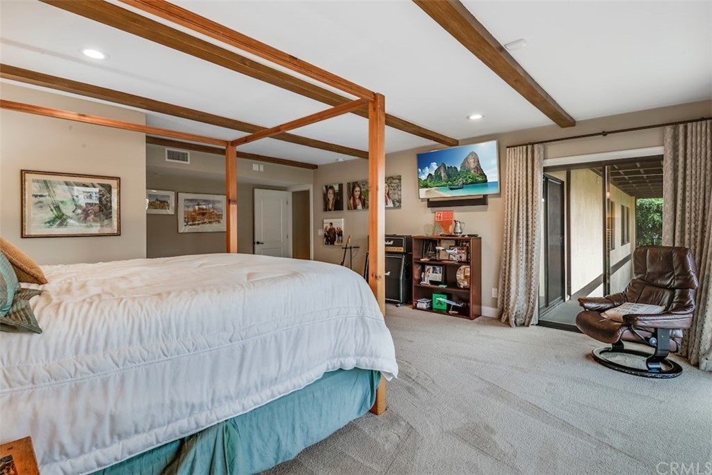 1539 Vía Coronel Palos Verdes Estates, CA 90274 - Photo 33 of 52 a bedroom with a bed a large mirror and a large window