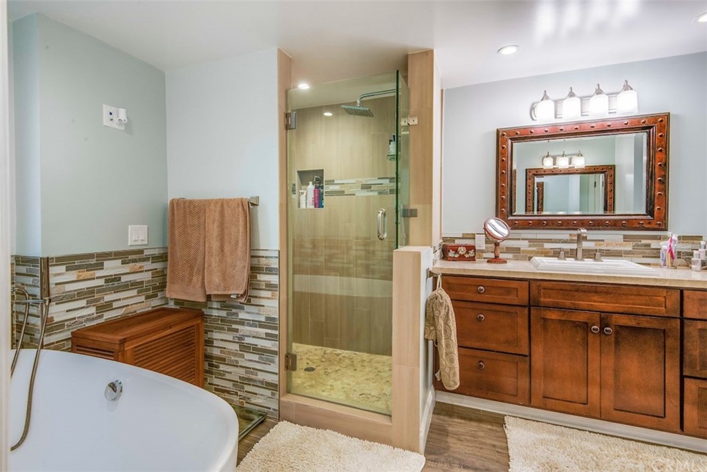 1539 Vía Coronel Palos Verdes Estates, CA 90274 - Photo 35 of 52 a bathroom with a double vanity sink mirror and shower