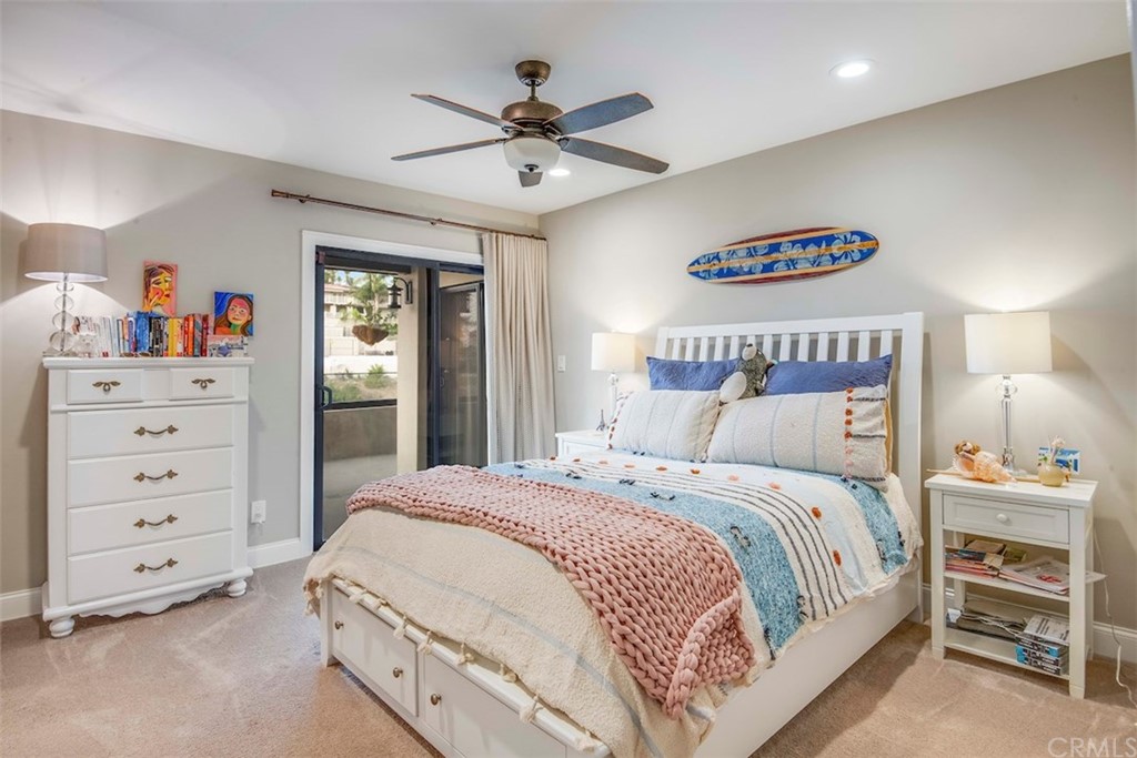 1539 Vía Coronel Palos Verdes Estates, CA 90274 - Photo 36 of 52 a bedroom with a large bed and a chandelier