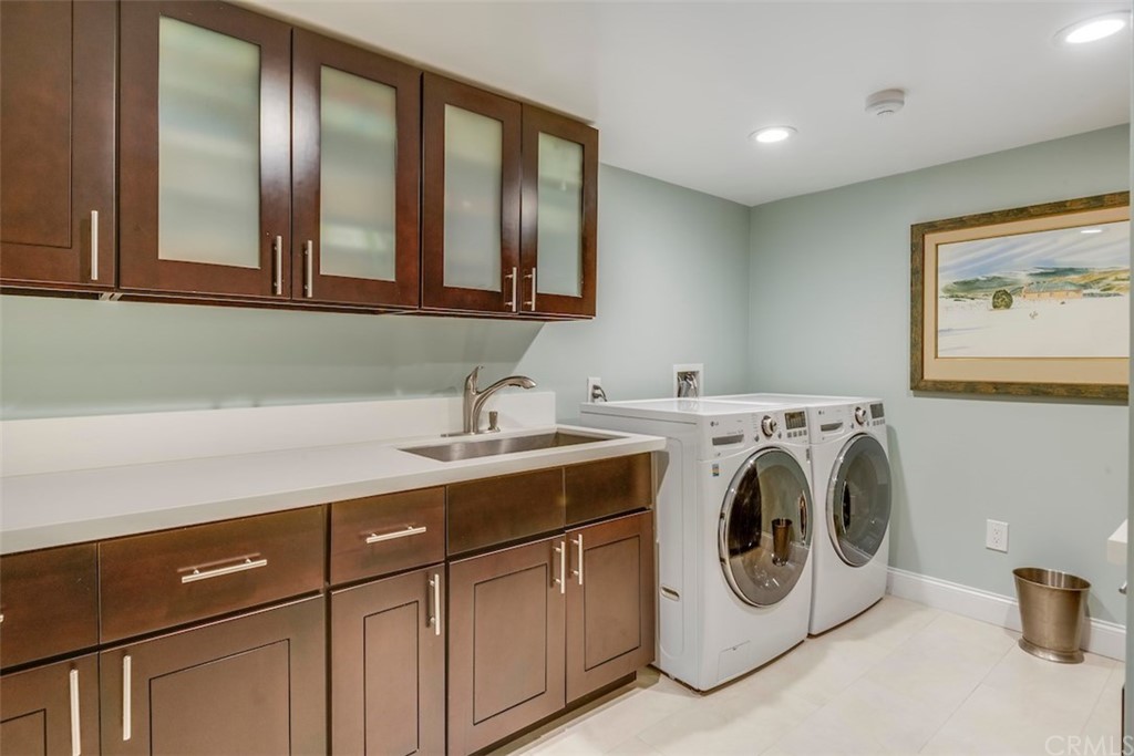 1539 Vía Coronel Palos Verdes Estates, CA 90274 - Photo 42 of 52 a utility room with sink dryer and washer