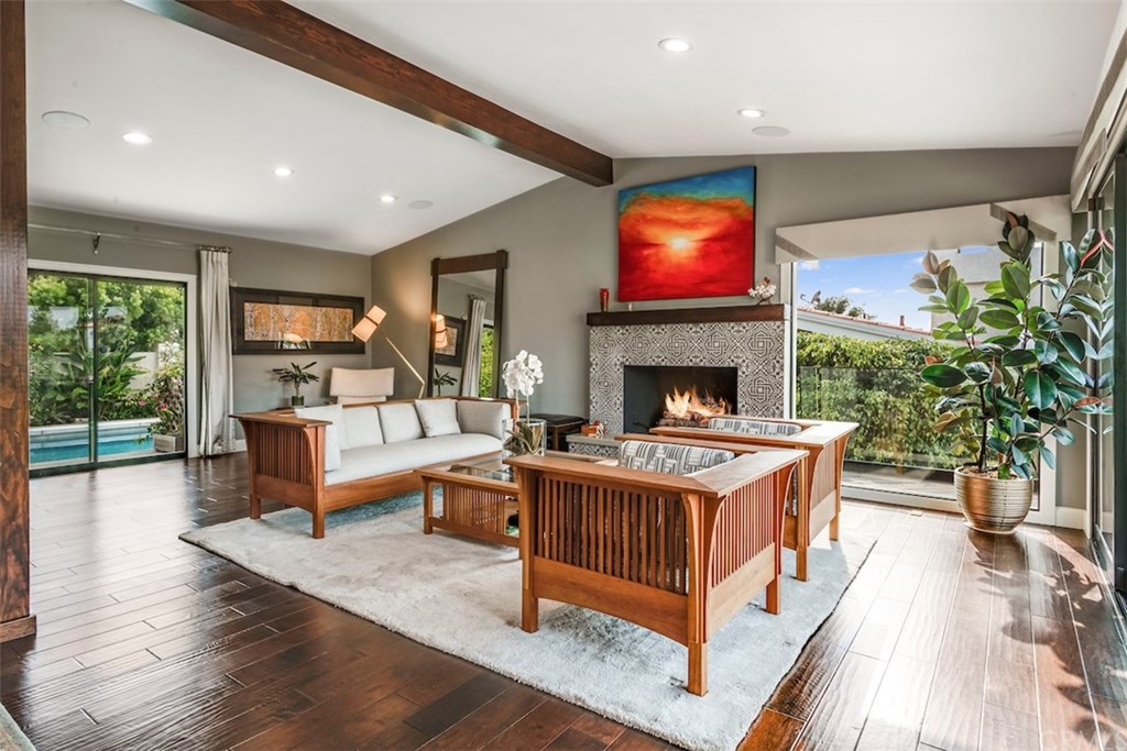 1539 Vía Coronel Palos Verdes Estates, CA 90274 - Photo 6 of 52 a living room with furniture a fireplace and a flat screen tv