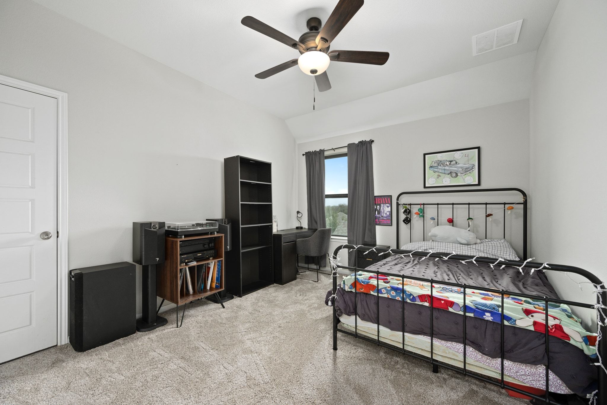 304 Wavy Cattail Cove Georgetown, TX 78626 - Photo 22 of 29 Bedroom featuring light colored carpet, ceiling fan, and vaulted ceiling