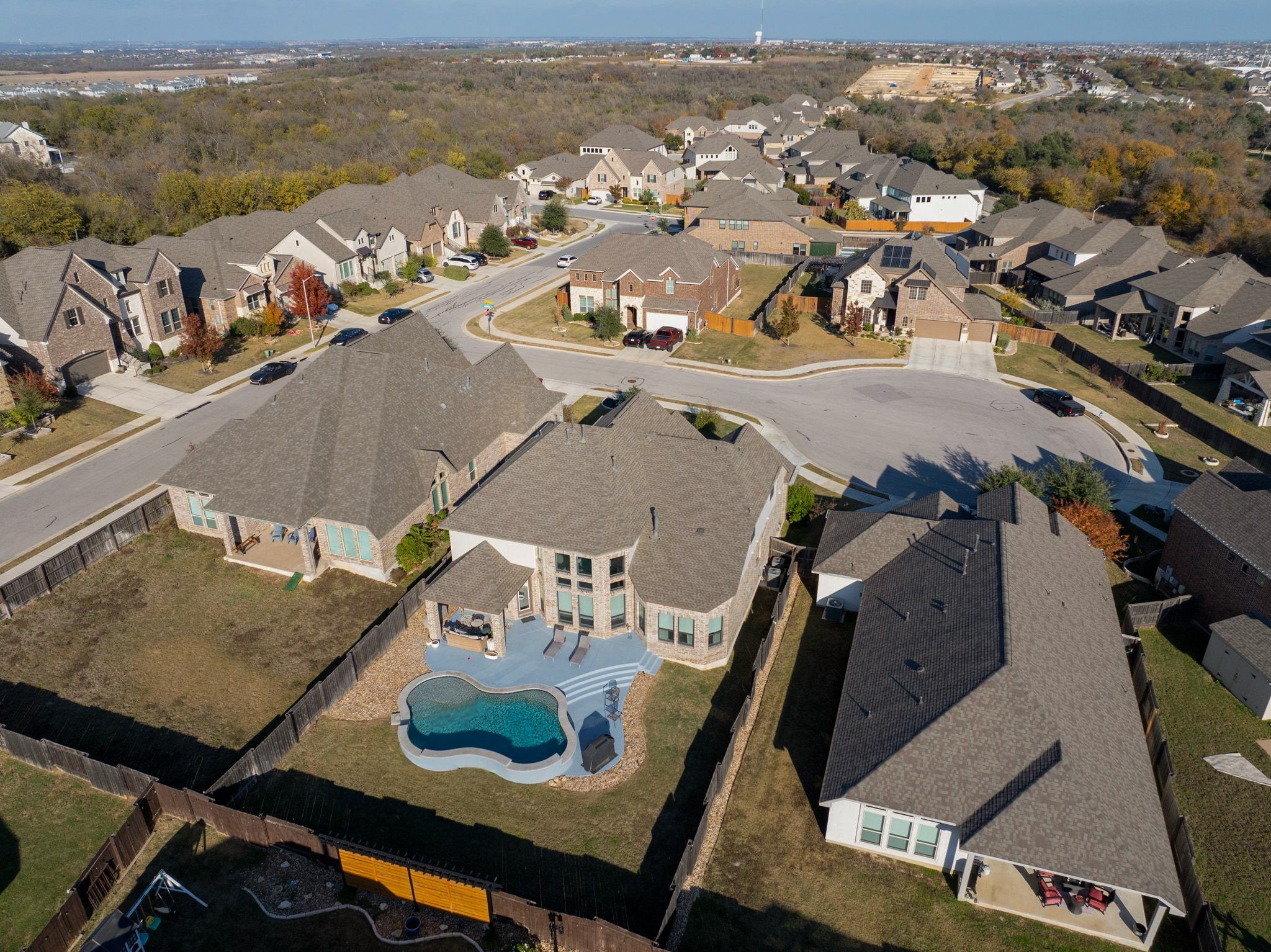 304 Wavy Cattail Cove Georgetown, TX 78626 - Photo 27 of 29 Aerial view of property's location with nearby suburban area and a pool