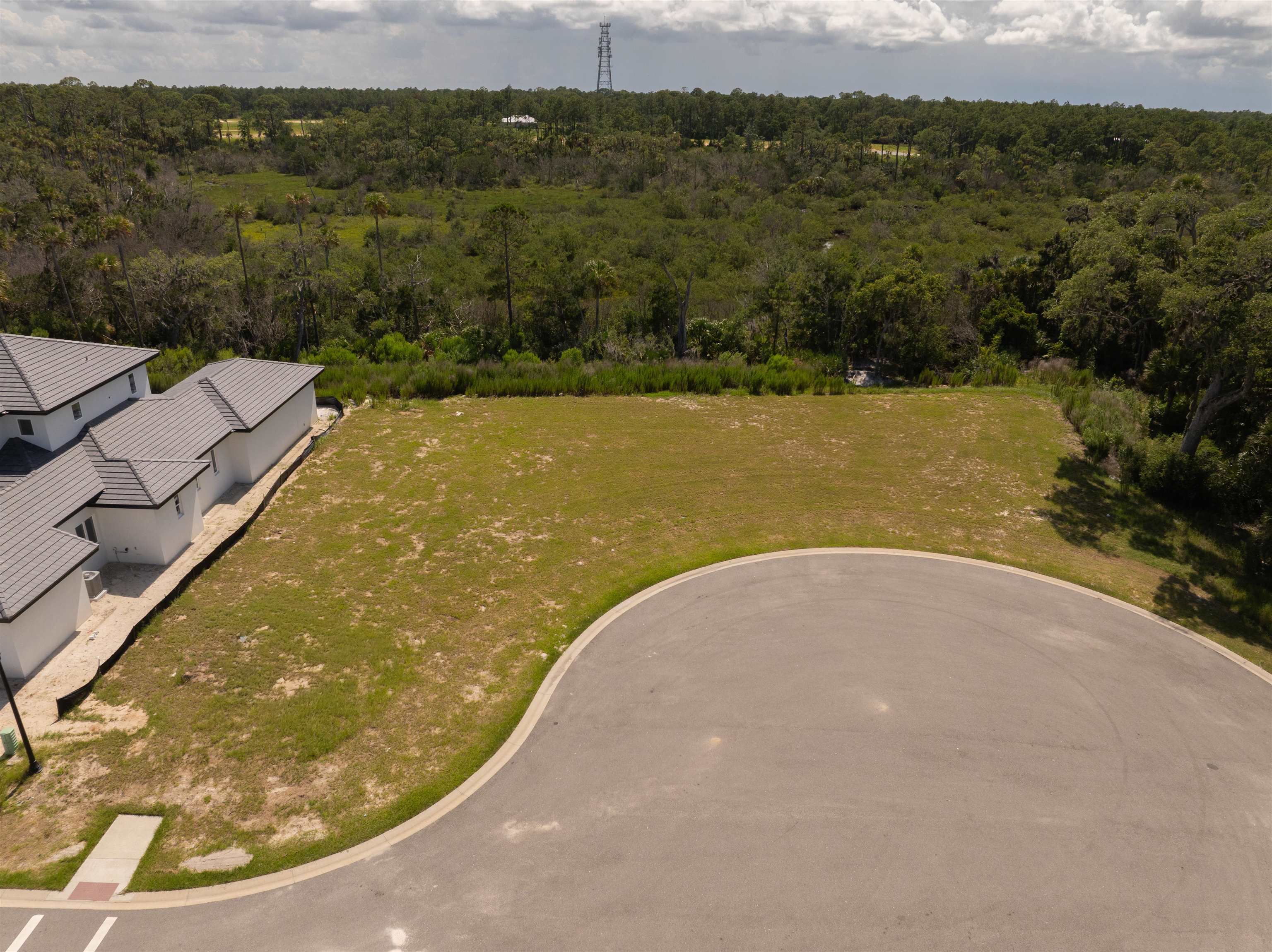 5 Coronado Road Flagler Beach, FL 32136 - Photo 4 of 18 a view of a lake in middle of the town