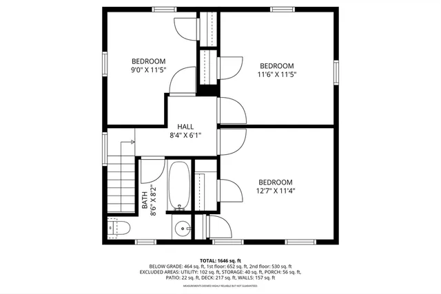 a picture of a bench in front of a wall