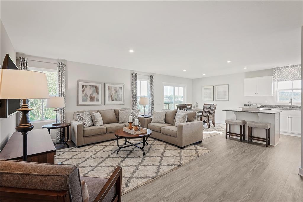 430 Spruce Lane Houston, PA 15342 - Photo 4 of 12 a living room with furniture and a wooden floor